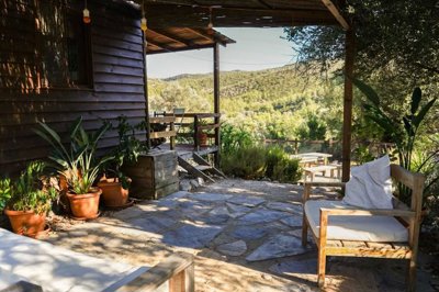 Charming Wooden House & Small Bungalow In Bodrum For Sale - Exterior seating areas in the shade with valley views