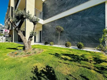 A Trendy Ground-Floor Apartment For Sale In Kusadasi - Landscaped garden