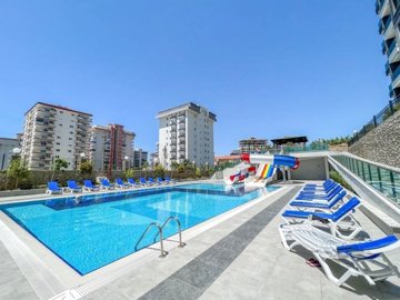 A Trendy Property In Alanya Is For Sale – Communal outdoor pool and sunbathing terraces