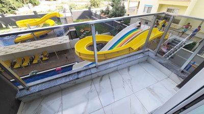 A Modern Apartment For Sale in Mahmutlar, Alanya - Bedroom balcony with pool views