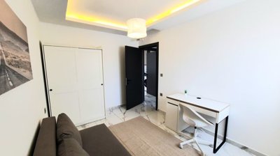 A Modern Apartment For Sale in Mahmutlar, Alanya - Bedroom used as a home office