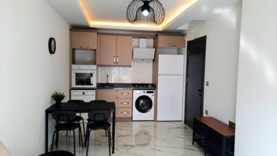 A Modern Apartment For Sale in Mahmutlar, Alanya - Fully fitted kitchen with white goods included