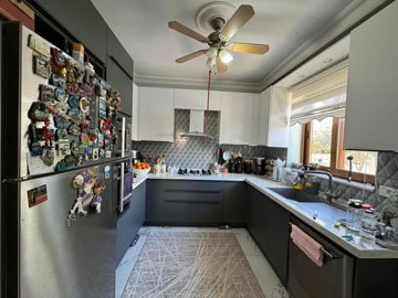 An Attractive Fethiye Property For Sale - Kitchen featuring built-in white goods