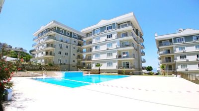 A Sea View Kusadasi Duplex Apartment For Sale With On-Site Facilities - An established complex with communal pools