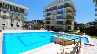 A Sea View Kusadasi Duplex Apartment For Sale With On-Site Facilities - Large communal pool and sun terraces