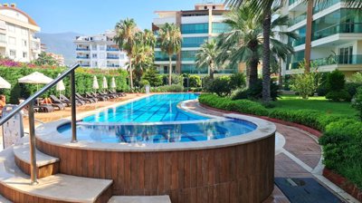 Fully Furnished Apartment For Sale In Alanya – Communal pools and landscaped gardens