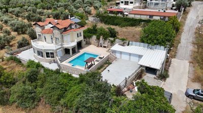 A Grand Detached Villa In Fethiye For Sale - Arial view showing the entire villa and exterior