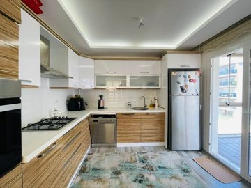 An Impressive Modern Kusadasi Apartment For Sale - A spacious kitchen