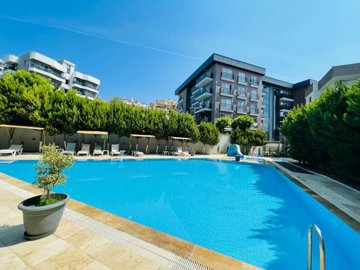 An Impressive Modern Kusadasi Apartment For Sale - Large communal swimming pool