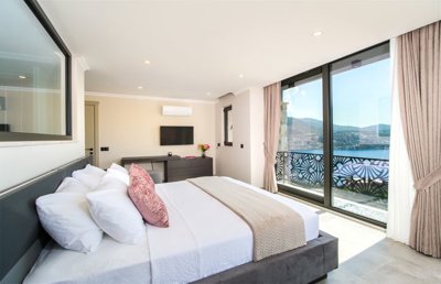 A High-End Sea-View Villa In Kalkan For Sale - Double bedroom with Juliette balcony