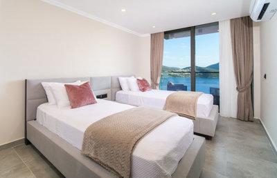 A High-End Sea-View Villa In Kalkan For Sale - Twin bedroom with balcony