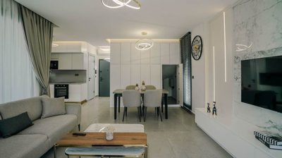 Detached Kusadasi Smart-Home Villa For Sale - Lounge through to the dining space