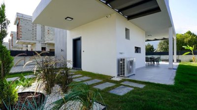 Detached Kusadasi Smart-Home Villa For Sale - Garden and covered terrace