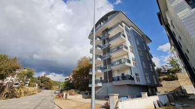 Brand-New Alanya Investment Apartment For Sale In Avsallar - View to the apartment block