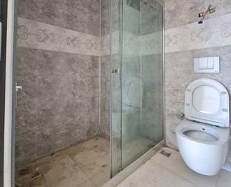 Brand-New Alanya Investment Apartment For Sale In Avsallar - Stylish bathroom