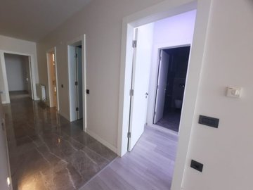 Modern Apartment Near The Beach In Kusadasi For Sale - Hallway leading to all rooms