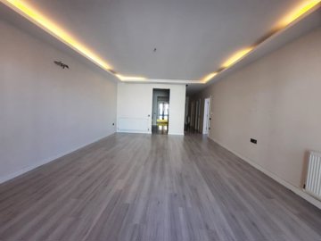 Modern Apartment Near The Beach In Kusadasi For Sale - Bedroom with an ensuite shower room