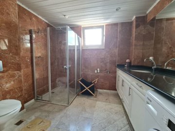 Fully Furnished Alanya Duplex Apartment  For Sale In Cikcilli - Large bathroom with corner shower cabin