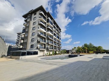 Newly Built One-Bedroom Alanya Apartment In Avsallar For Sale - Communal pool and sun terraces