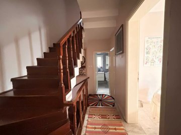 A Pretty Semi-Detached Triplex Villa In Bodrum For Sale - Hallway and wooden staircase