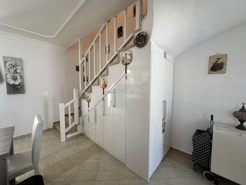 A Lovely Semi-Detached Duplex Villa For Sale In Dalyan With A Shared Pool - Handy fitted storage under the stairs