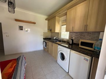 A Pretty Ground Floor, Garden Apartment For Sale In Scenic Dalyan - Fully fitted kitchen