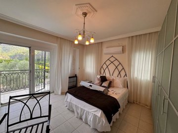 A Unique Villa For Sale In Dalyan - Master bedroom with a private nature view balcony