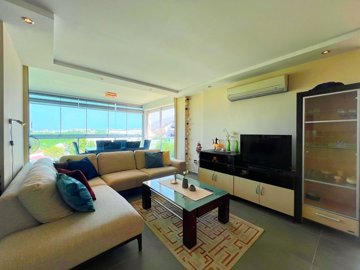 A Sea & Nature View Alanya Duplex Apartment For Sale In Kargicak - Lounge with wall to wall windows