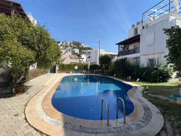 Spotless 3-Bedroom Duplex Apartment In Yalikavak, Bodrum Is For Sale - Communal swimming pool and sun terraces