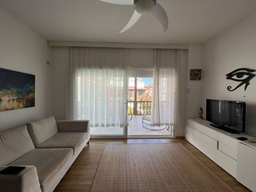 Spotless 3-Bedroom Duplex Apartment In Yalikavak, Bodrum Is For Sale - Lounge with balcony access