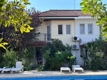 A Semi-detached Villa For Sale In Dalyan With A Shared Pool - Established gardens around the property