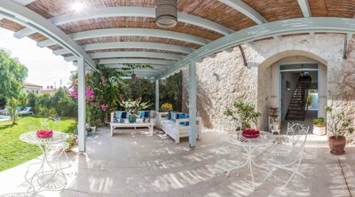 Idyllic Boutique Hotel For Sale In Alacati - Shaded seating areas in the gardens