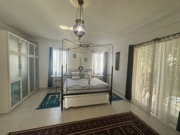 Unique Villa & Self-Contained Apartment For Sale In Dalyan - Spacious double bedroom with custom-built furniture