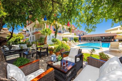 Modern Hotel In Dalyan For Sale - Shaded seating areas around the pool