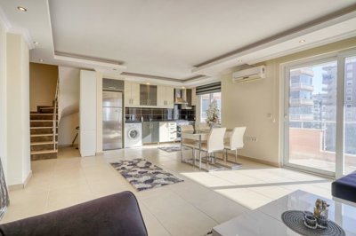 Spotless Duplex Apartment For Sale in Mahmutlar, Alanya - A bright and airy living space