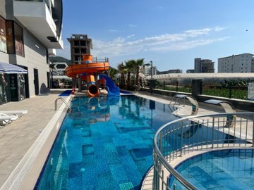 Spacious 2-Bedroom Apartment For Sale In Alanya - Communal swimming pools and sun terraces