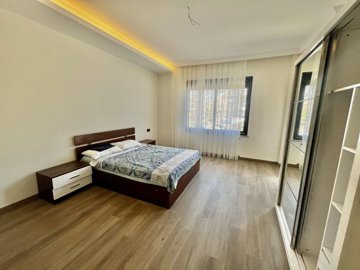 Impressive Triplex Property For Sale In Kargicak, Alanya - Master bedroom featuring an ensuite shower room