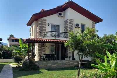 Detached Villa With A Shared Pool For Sale In Dalyan - A traditional property with mature gardens and a shared pool