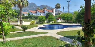 Detached Villa With A Shared Pool For Sale In Dalyan - Established gardens surrounded by natural views