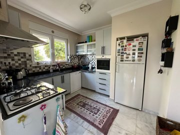 Magnificent Property For Sale In Kargicak, Alanya - A modern, decked out kitchen with appliances