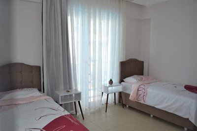 A Modern Triplex Villa For Sale in Belek, Antalya - Spacious twin bedroom