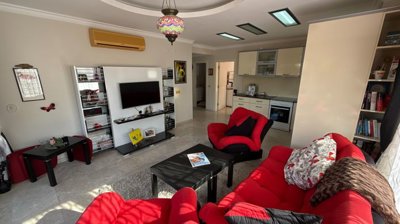 A Ready To Move Apartment In Antalya For Sale - a spacious living area with plenty of natural light