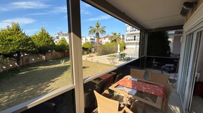 A Ready To Move Apartment In Antalya For Sale - Lovely sunny balcony with garden views and the choice of opening or closing completely