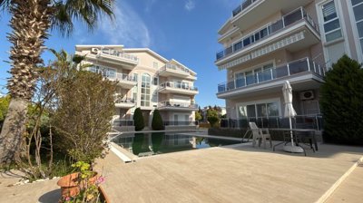 A Ready To Move Apartment In Antalya For Sale - Shared swimming pool and sun terraces for residents