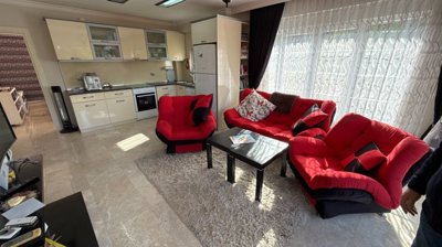 A Ready To Move Apartment In Antalya For Sale - Lounge area to the kitchen