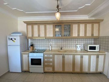 A Sea View Duplex Apartment In Didim For sale - A fully fitted kitchen with white goods