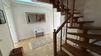 Duplex Investment Property In Belek For Sale - A beautiful solid wood staircase