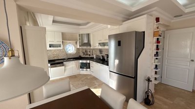 Duplex Investment Property In Belek For Sale - From the dining area to the modern kitchen