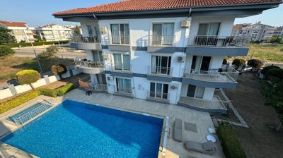 Spotless Apartment In Antalya For Sale - Main view of the apartment complex and communal swimming pool