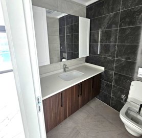 Alanya Apartment For Sale In Kargicak - Vanity unit with handy storage and accessories